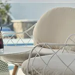 Myconian Kyma, A Member Of Design